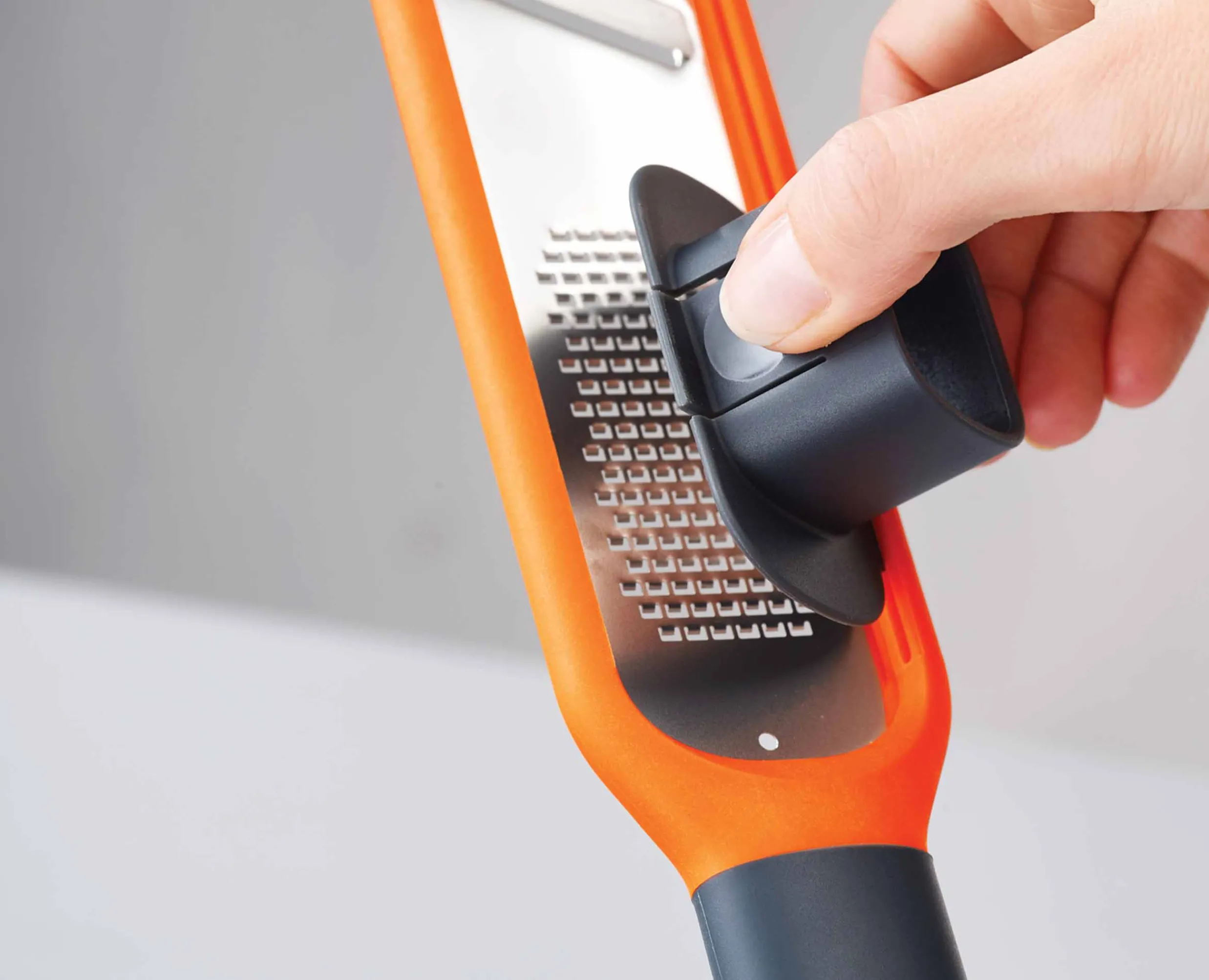 Mini Râpe Eminceur 2-en-1 Handi-Grate™ Râpes Et Zesteurs