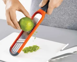 Mini Râpe Eminceur 2-en-1 Handi-Grate™ Râpes Et Zesteurs