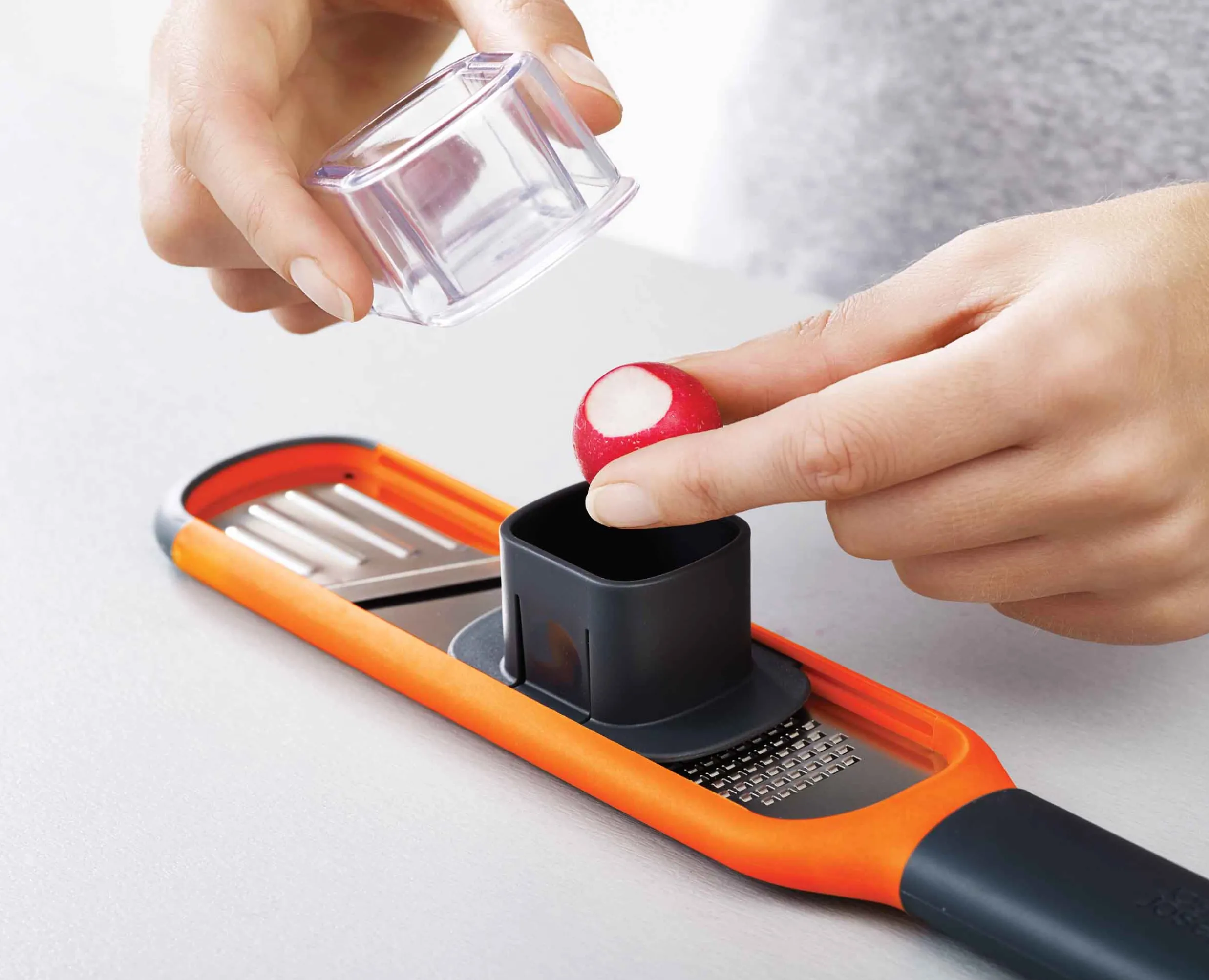 Mini Râpe Eminceur 2-en-1 Handi-Grate™ Râpes Et Zesteurs